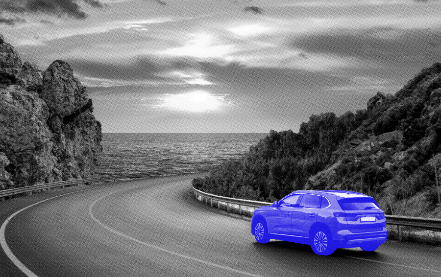 A car on a winding mountain road