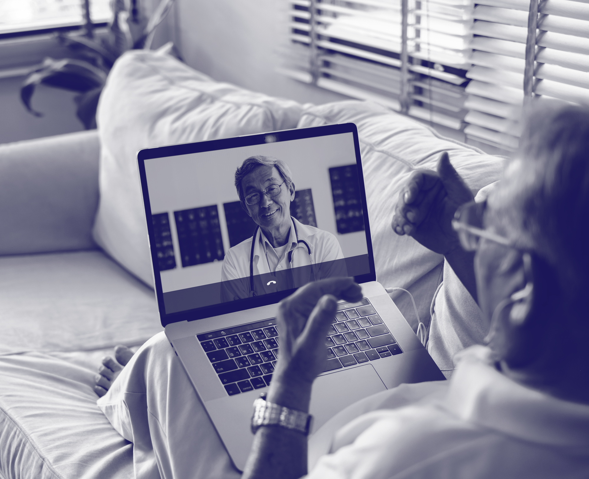 patient talking to a healthcare provider on laptop